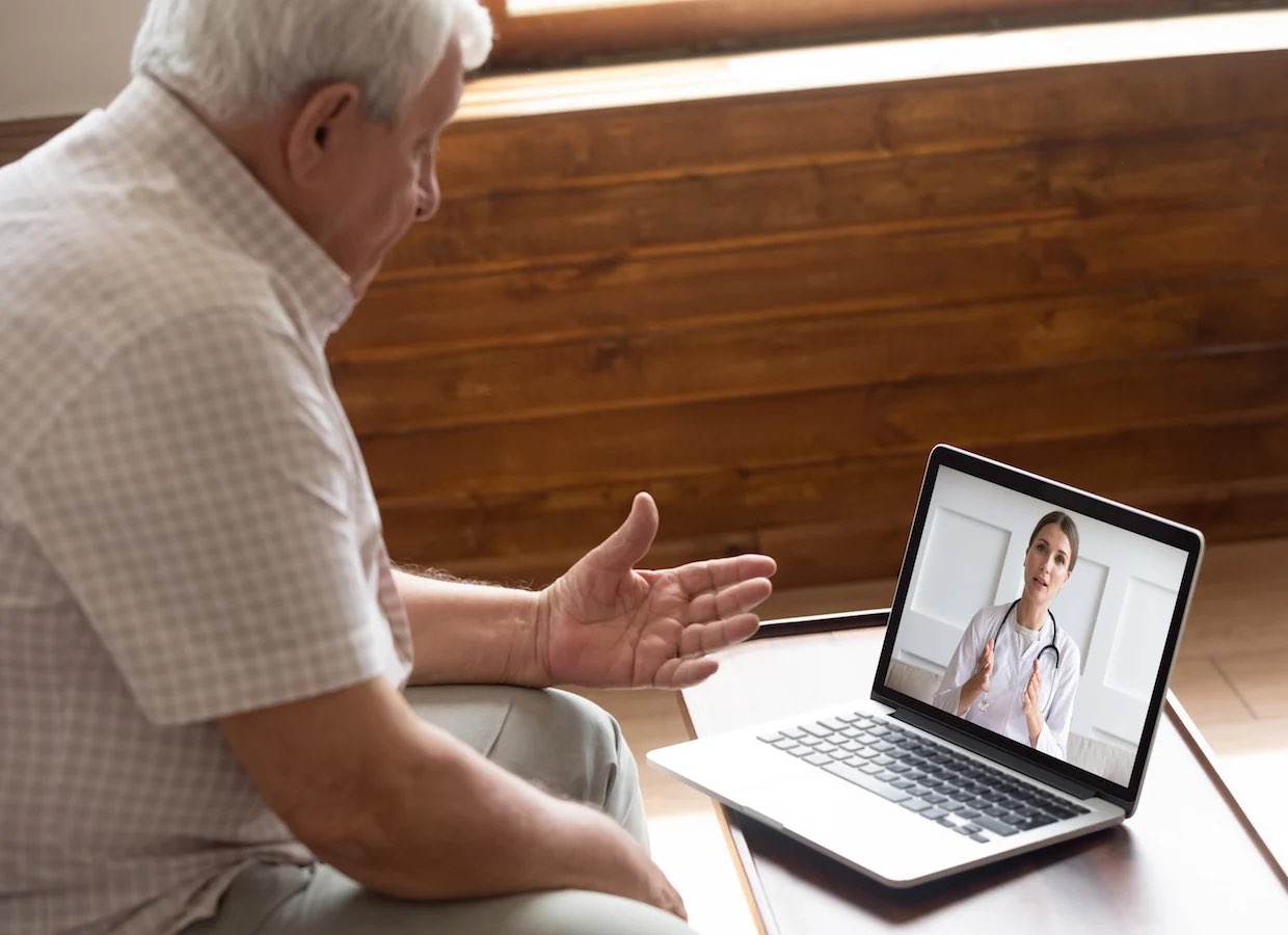 Man Talking to Doctor on Tablet-1